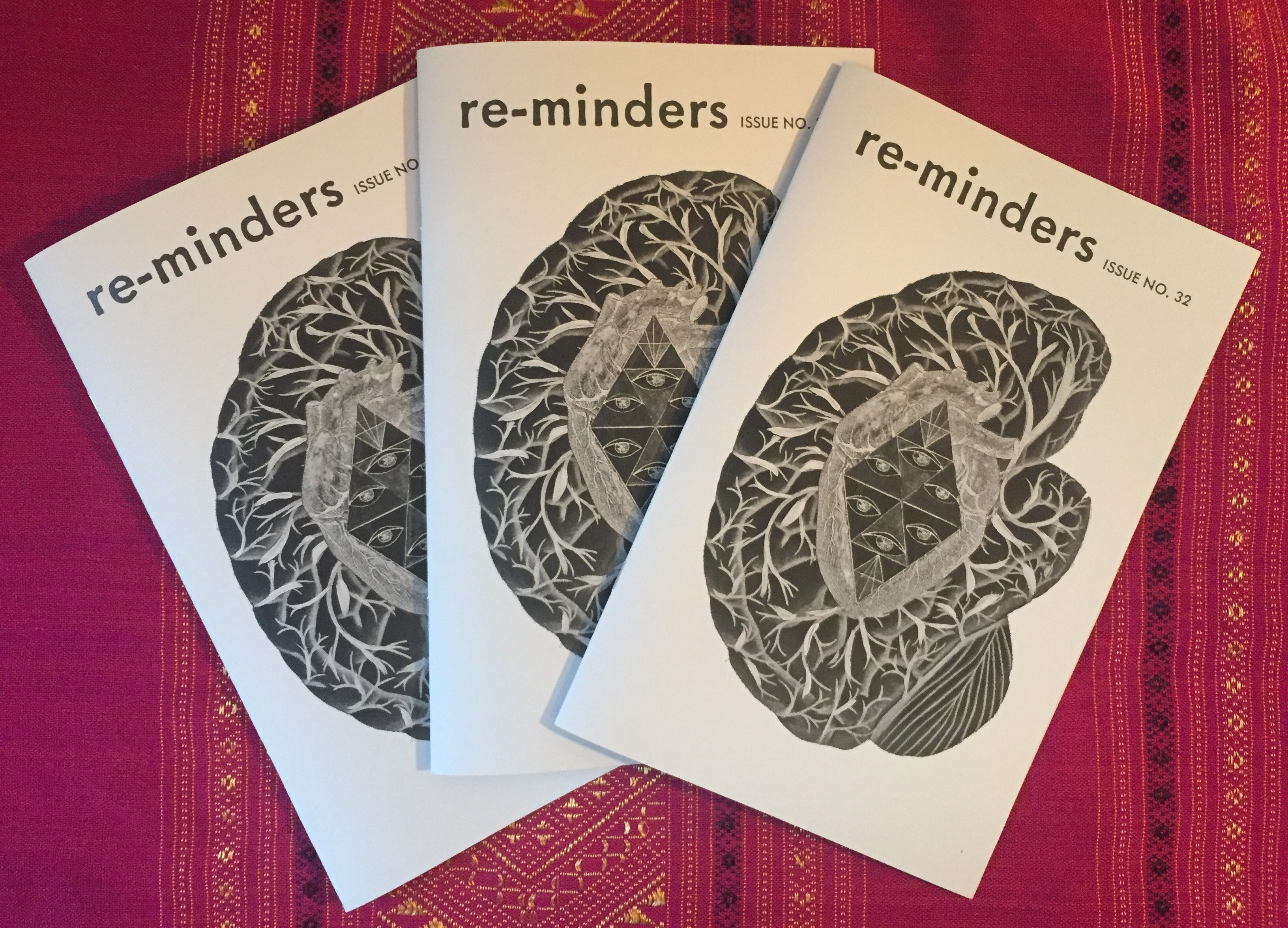 3 zines titled "reminders" on display